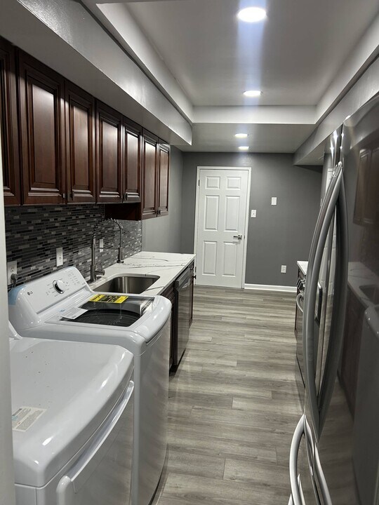 10246 Prince Pl, Unit 108 in Largo, MD - Building Photo