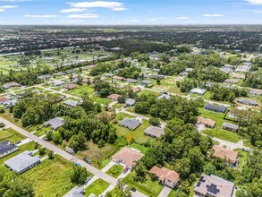 2412 Millie Ave S in Lehigh Acres, FL - Building Photo - Building Photo