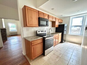 2803 W Queen Ln, Unit 1 in Philadelphia, PA - Building Photo - Building Photo