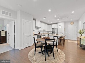2324 Wind Charm St, Unit 103 in Herndon, VA - Building Photo - Building Photo