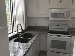 4222 Inverrary Blvd-Unit -4203 in Lauderhill, FL - Building Photo - Building Photo