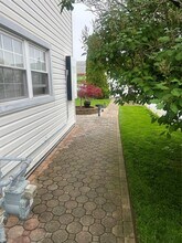 696 N Indiana Ave in Lindenhurst, NY - Building Photo - Building Photo