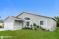 517 SW 25th Ln in Cape Coral, FL - Foto de edificio - Building Photo