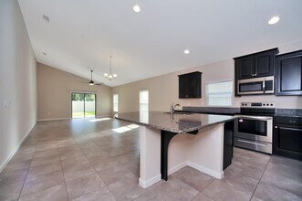 1183 Musgrass Cir in West Melbourne, FL - Building Photo - Building Photo