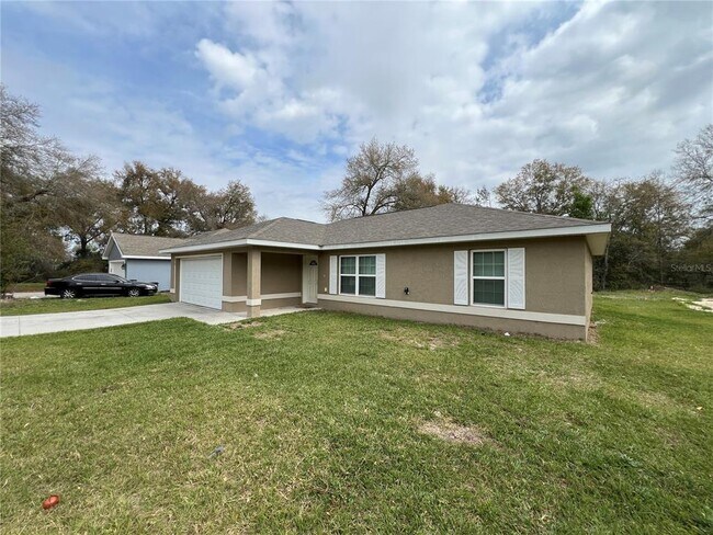 219 Malauka Loop in Ocklawaha, FL - Building Photo - Building Photo