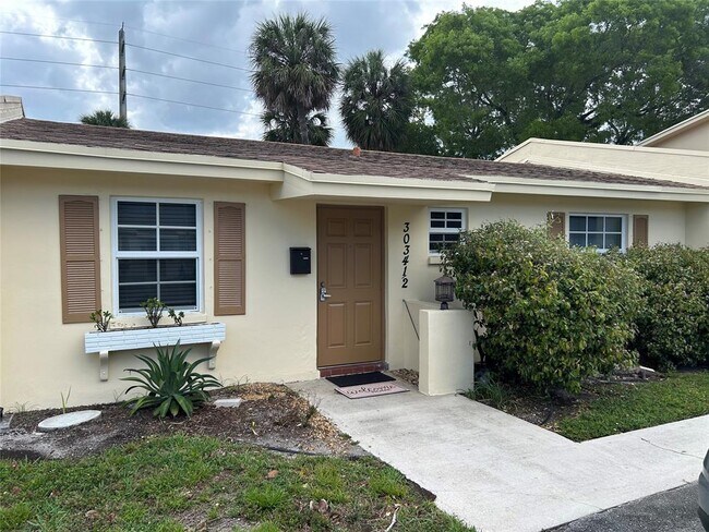 property at 3034 NW 69th Ct