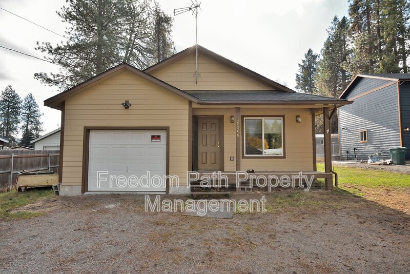 18368 W Main St in Hauser, ID - Foto de edificio