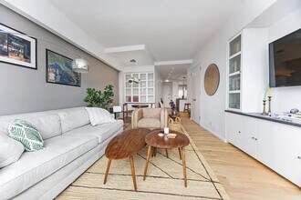 60 E 8th St in New York, NY - Building Photo - Building Photo