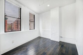 63 Spring St in New York, NY - Building Photo - Building Photo