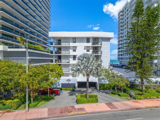 property at 5845 Collins Ave