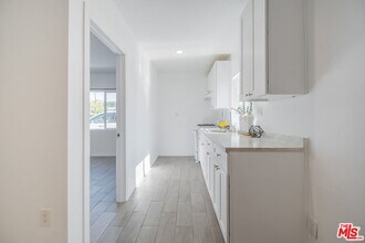 8105 Bevis Ave in Los Angeles, CA - Building Photo - Building Photo
