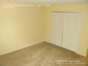 2202 Cascades Blvd-Unit -Unit 208 in Kissimmee, FL - Building Photo - Building Photo