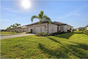 19573 Hinkley Dr in Estero, FL - Building Photo