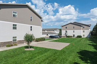 The Pines Luxury Security Apartments in Minot, ND - Building Photo - Building Photo