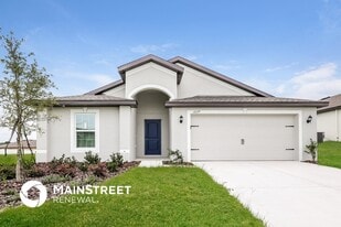 1677 Hideaway Flat St in Mascotte, FL - Building Photo