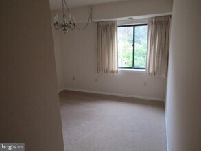 2921 N Leisure World Blvd-Unit -1-305 in Silver Spring, MD - Building Photo - Building Photo