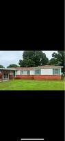 2411 East George Richey Road in Longview, TX - Building Photo