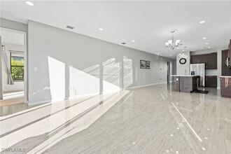 8976 Madrid Cir in Naples, FL - Building Photo - Building Photo