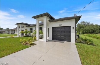 1025 Meadow Rd in Lehigh Acres, FL - Building Photo - Building Photo