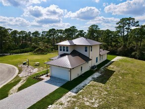 149 Southeast Cor. Arno in Port St. Lucie, FL - Building Photo - Building Photo