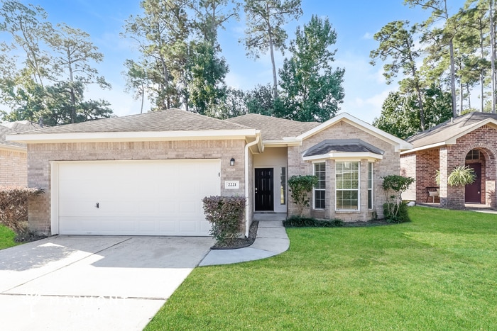 2221 Nicholas Crossing in Conroe, TX - Building Photo