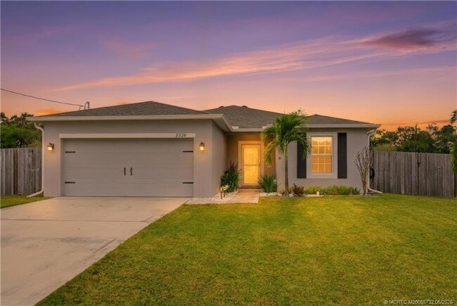 property at 2220 SE Lucaya St