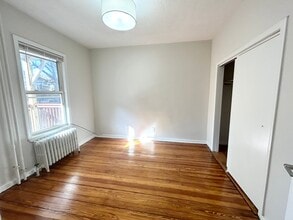 153 E Cottage St, Unit #1 in Boston, MA - Building Photo - Building Photo