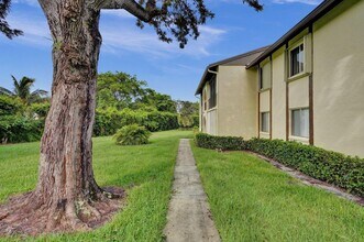 5900 Whispering Pine Way in Greenacres, FL - Building Photo - Building Photo