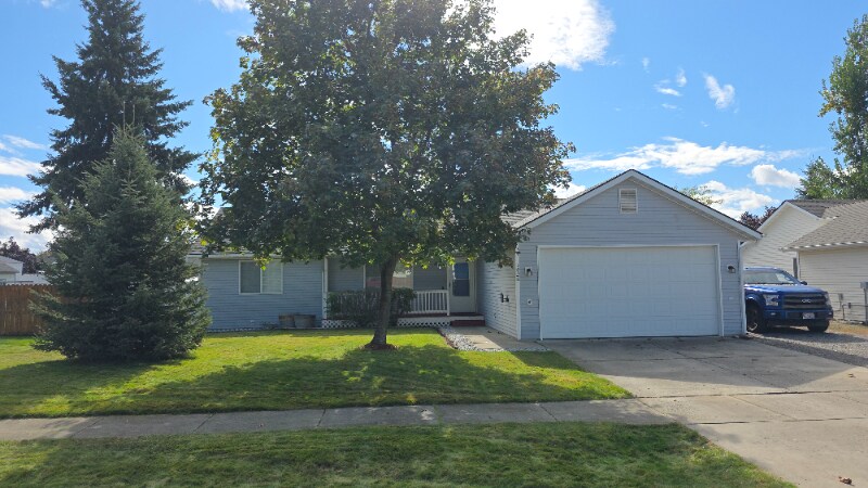 1428 W Heron Ave in Hayden, ID - Building Photo