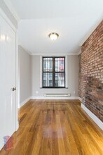 325 E 5th St in New York, NY - Building Photo - Building Photo