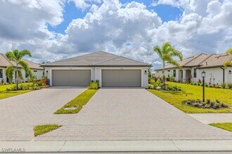 19601 Hinkley Dr in Estero, FL - Building Photo - Building Photo