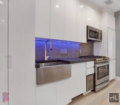 STANTON ST., Unit 6F in New York, NY - Building Photo