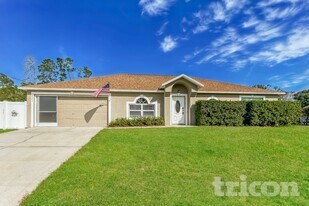 9297 Oak Grove St in Spring Hill, FL - Building Photo