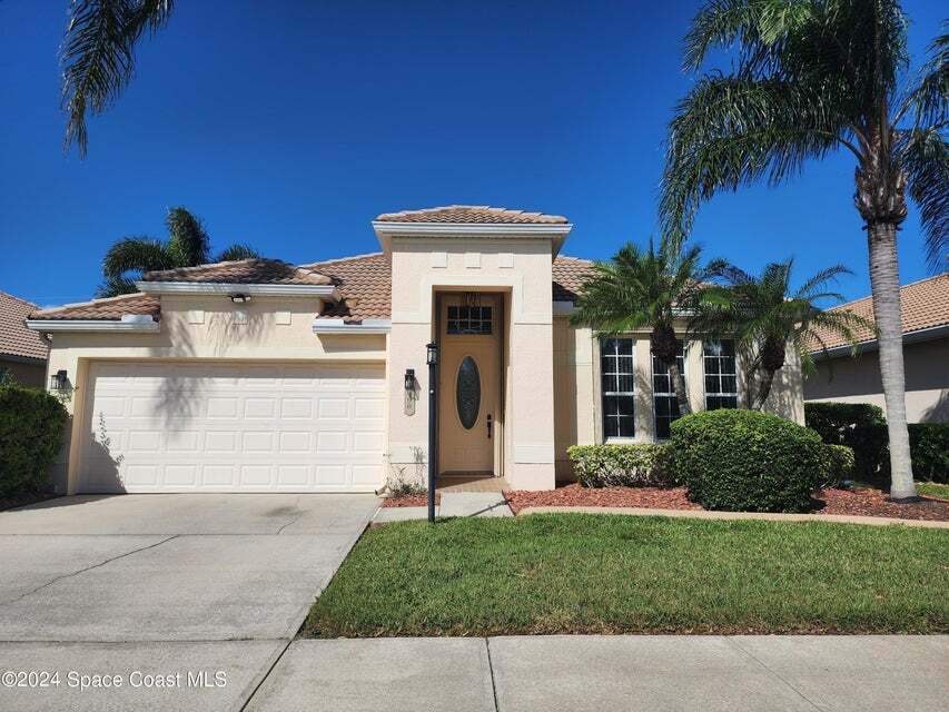 490 Glen Abbey Way in Melbourne, FL - Foto de edificio