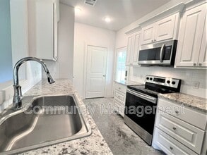 7677 River Ridge Dr in Denham Springs, LA - Building Photo - Building Photo