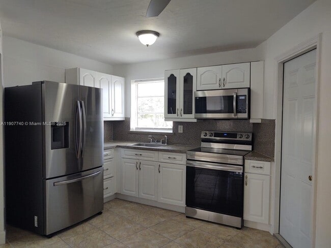 property at 1611 NE Miami Gardens Dr