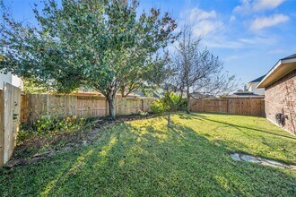 8815 Rollick Dr in Tomball, TX - Building Photo - Building Photo