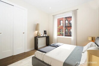 99 Suffolk St, Unit 2E in New York, NY - Building Photo - Building Photo