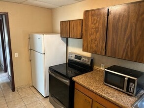 313 S 3rd St, Unit #1 in Oskaloosa, IA - Building Photo - Building Photo