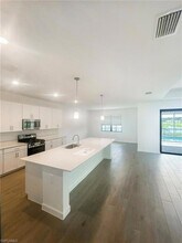 19421 Hinkley Dr in Estero, FL - Building Photo - Building Photo