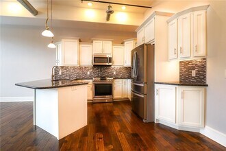 64 E Market St, Unit 202 in Corning, NY - Building Photo - Building Photo