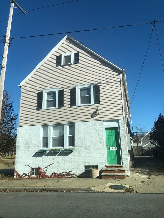 property at 1239 W 67th St