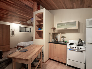 9015 42nd Avenue Northeast, Unit Treetop Studio in Seattle, WA - Building Photo - Building Photo