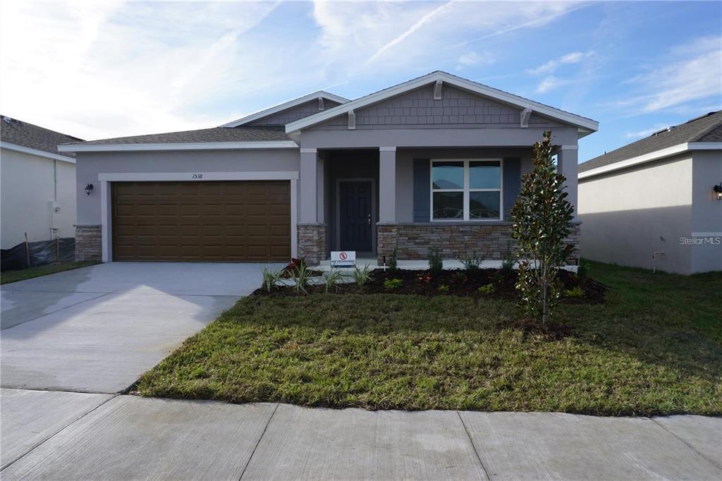 1538 Blue Lagoon Cir in Mascotte, FL - Building Photo