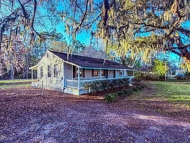 property at 13828 Woodland Dr
