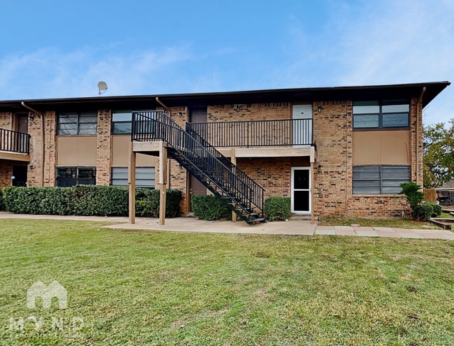 property at 624 E 3rd St