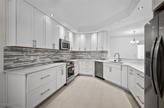 property at 7056 Pelican Bay Blvd