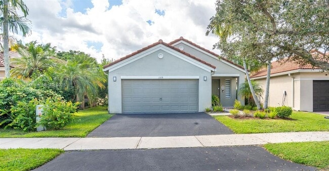 1328 Plumosa Way in Weston, FL - Building Photo - Building Photo