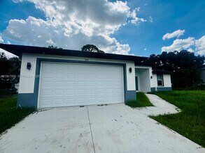 1731 Unice Ave N in Lehigh Acres, FL - Building Photo - Building Photo