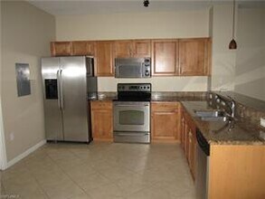 10033 Heather Ln-Unit -5-502 in Naples, FL - Building Photo - Building Photo